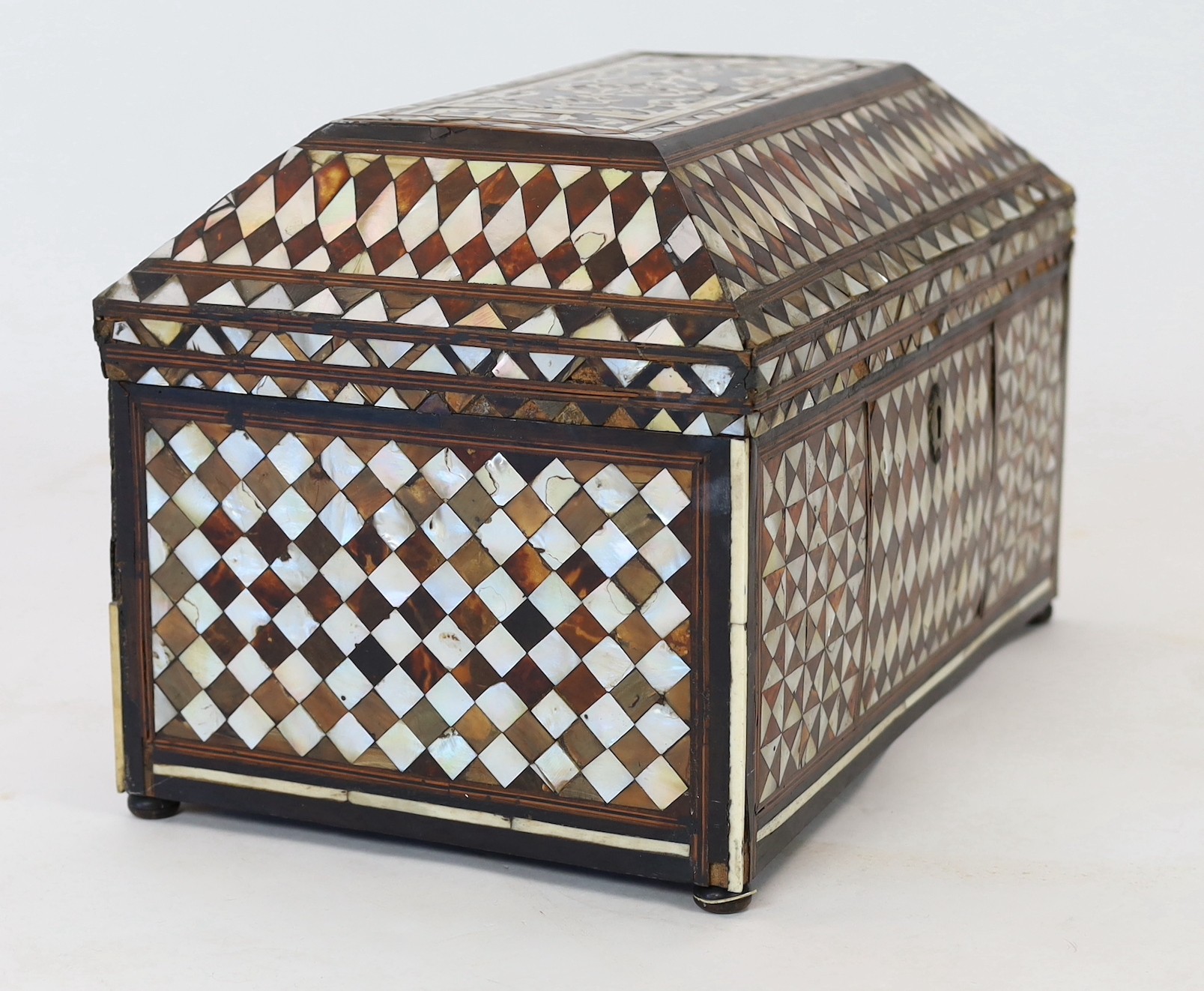 A late 18th/early 19th century Ottoman tortoiseshell and mother-of-pearl scribe’s casket, 49cm wide 30cm deep 31cm high